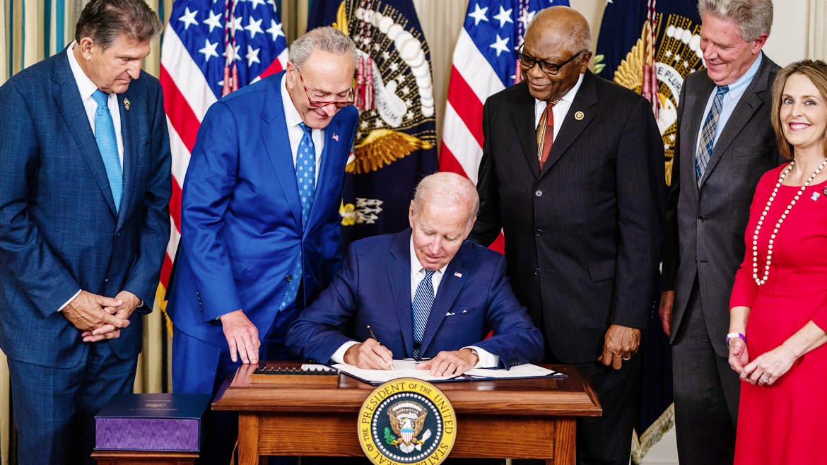 US President Joe Biden signs into law H.R. 5376, the Inflation Reduction Act of 2022 (climate change and health care bill) in the State Dining Room of the White House on Tuesday August 16, 2022. From left, Sen. Joe Manchin (D-W.VA), Senate Majority Leader Chuck Schumer (D-NY), House Majority Whip Rep. James Clyburn (D-SC), Rep. Frank Pallone (D-NJ), and Rep. Kathy Castor (D-FL).
