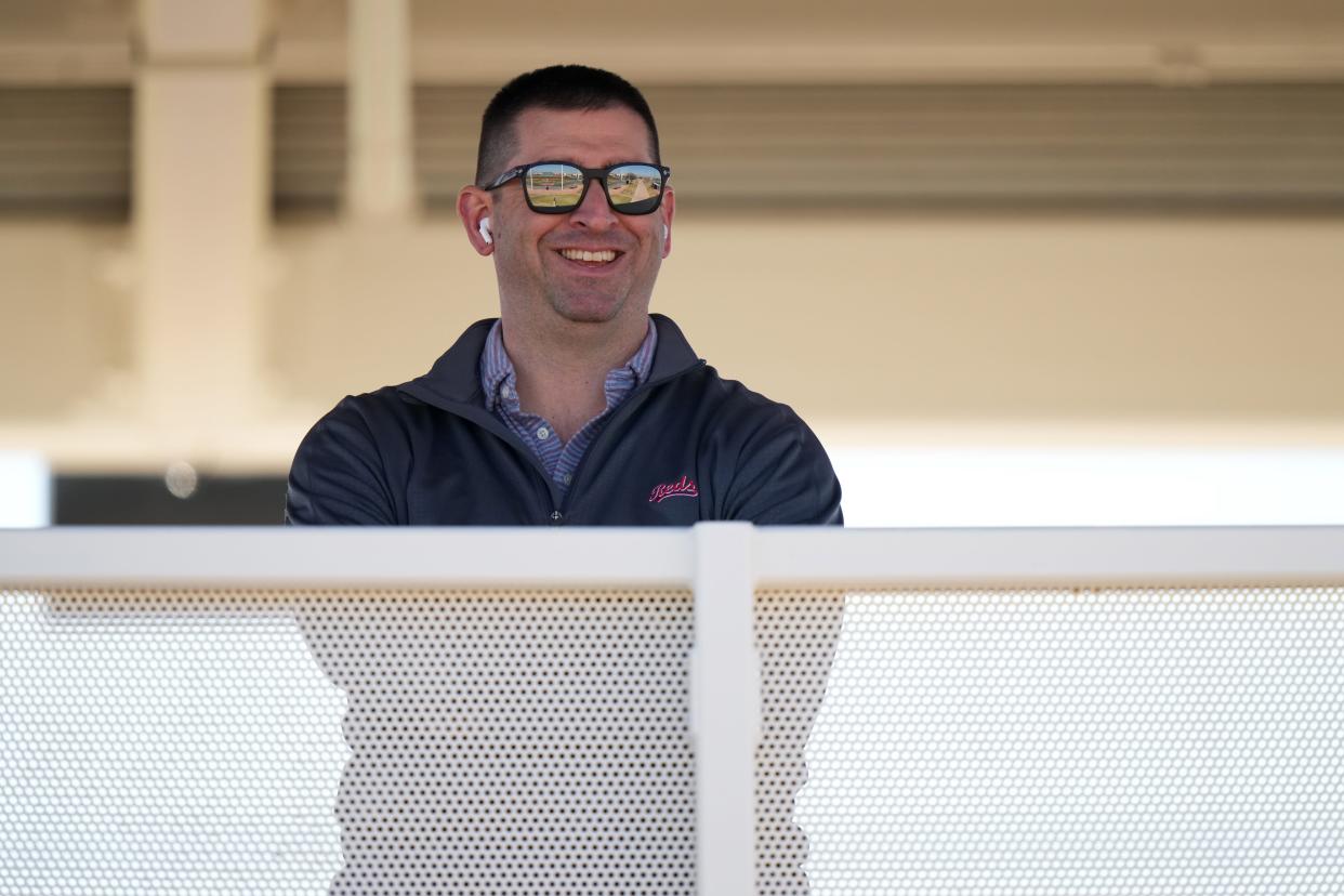 Could Reds president of baseball operations Nick Krall, shown here during spring training, be looking to add a bat to help the team's beleaguered offense?