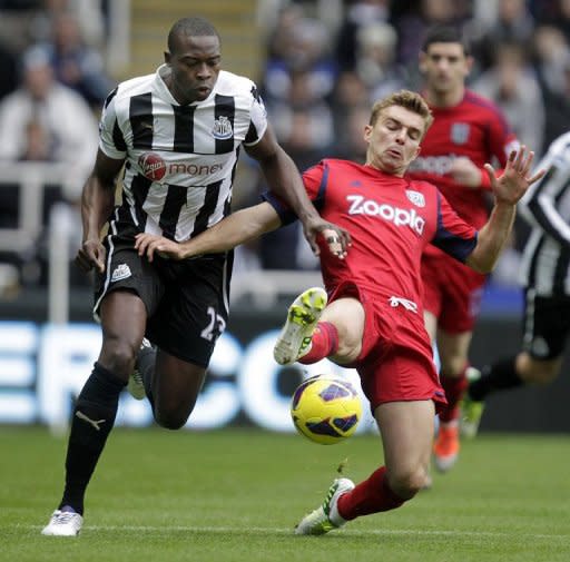 Newcastle United and Nigerian striker Shola Ameobi (L) in action against West Bromwich Albion last month. Ameobi could make his debut for Nigeria at 31 -- 10 years after turning down another approach to switch allegiances having played for England at age-limit level