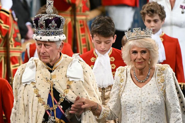 <p>JUSTIN TALLIS/POOL/AFP via Getty Images</p> King Charles and Queen Camilla at the State Opening of Parliament on Nov 7, 2023