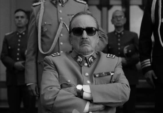 Jaime Vadell as Augusto Pinochet recreates an infamous historical photo.<span class="copyright">Pablo Larraín—Netflix</span>