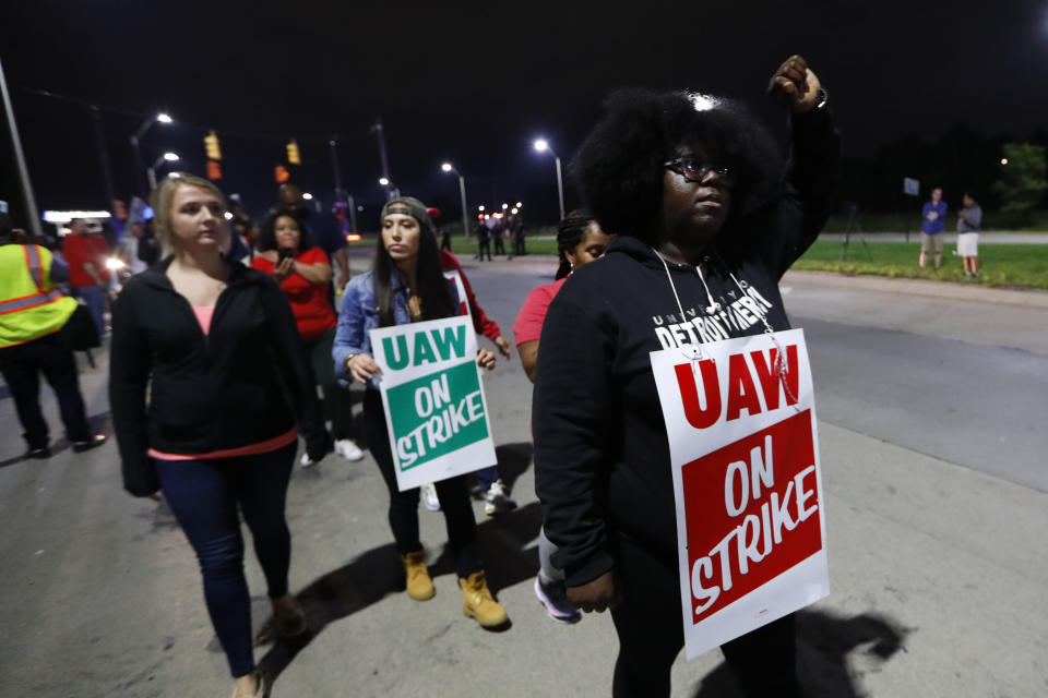 United Auto Workers members picket outside the General Motors Detroit-Hamtramck assembly plant in Hamtramck, Mich., early Monday, Sept. 16, 2019. Roughly 49,000 workers at General Motors plants in the U.S. planned to strike just before midnight Sunday, but talks between the UAW and the automaker will resume. (AP Photo/Paul Sancya)