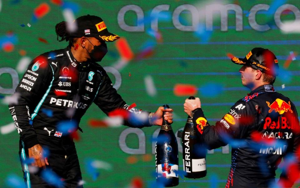 Lewis Hamilton congratulates Max Verstappen - REUTERS