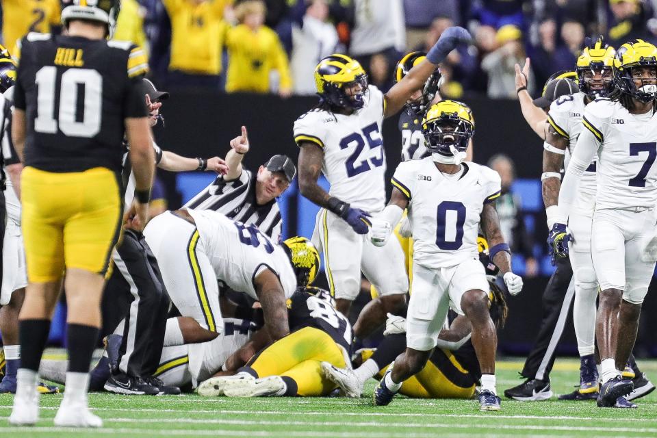 Michigan defensive back Mike Sainristil celebrates a play against Iowa during the first half of the Big Ten championship game at Lucas Oil Stadium in Indianapolis, Ind. on Saturday, Dec. 2, 2023.