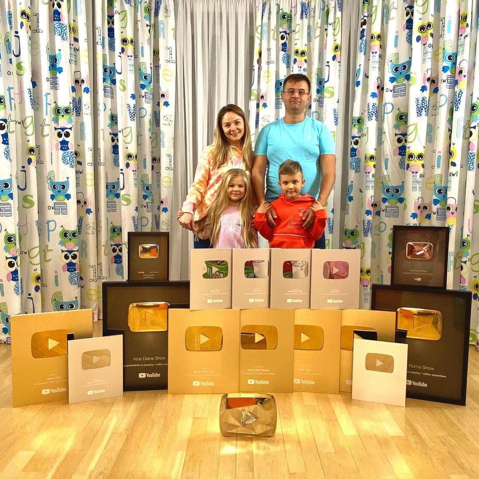 A picture of the family with their YouTube awards.
