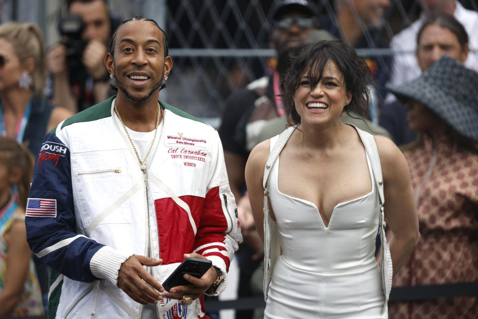 MIAMI, FLORIDA - MAY 07: Ludacris and Michelle Rodriguez watch the grid presentation prior to the F1 Grand Prix of Miami at Miami International Autodrome on May 07, 2023 in Miami, Florida. (Photo by Jared C. Tilton/Getty Images)