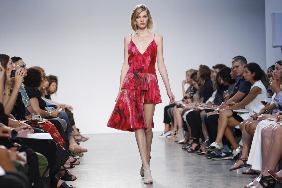 The Thakoon Spring 2014 collection is modeled during Fashion Week in New York, Sunday, Sept. 8, 2013. (AP Photo/John Minchillo)