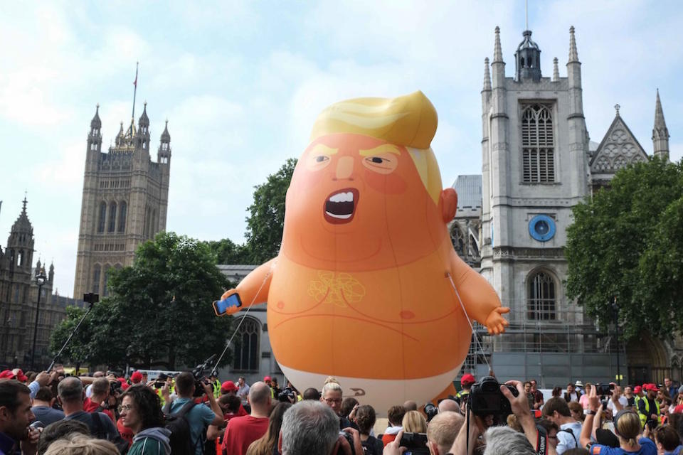 The six metre high helium filled inflatable of Donald Trump was out in London during protests at his visit last year (Picture: PA)