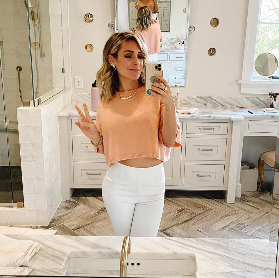 <p>The <em>Very Cavallari</em> alum and mom of three is throwing up <a href="https://www.instagram.com/p/CHIuAizHGYg/" rel="nofollow noopener" target="_blank" data-ylk="slk:a peace sign;elm:context_link;itc:0;sec:content-canvas" class="link ">a peace sign</a> while taking advantage of the great lighting in her bathroom at home in Nashville, Tennessee. The reality star seems to be doing some remodeling in the space, as there are four holes in the wall awaiting lighting fixtures. </p>