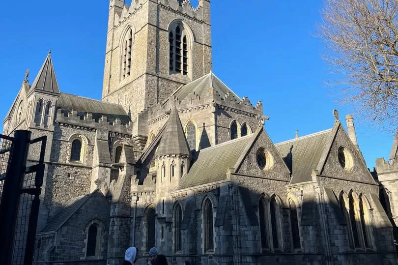 The sun shines on the 100-year-old Christ Church Cathedral