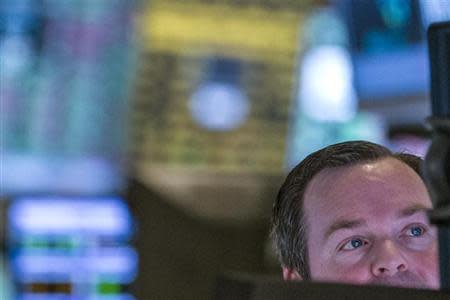 A trader works on the floor of the New York Stock Exchange January 6, 2014. REUTERS/Brendan McDermid