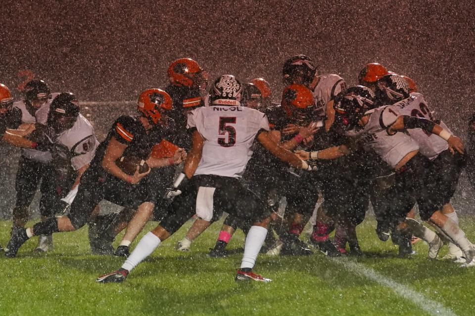 Indian Lake and North Union played in a first-half downpour last season in a Central Buckeye Conference Mad River Division football game.
