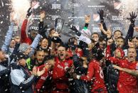 <p>Michael Bradley #4 of Toronto FC and teammates celebrate with the Eastern Conference Trophy following the MLS Eastern Conference Final, Leg 2 game against Montreal Impact at BMO Field on November 30, 2016 in Toronto, Ontario, Canada. (Photo by Vaughn Ridley/Getty Images) </p>