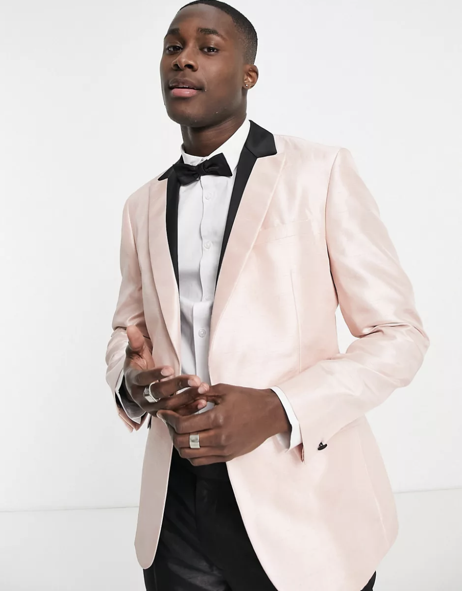 <p><strong>Topman</strong></p><p>asos.com</p><p><strong>$125.50</strong></p><p>This soft pink ensemble is a cool departure from a black tux, but still totally wearable. Pair it with a white button-up and black bowtie for a sleek, dapper style.</p>