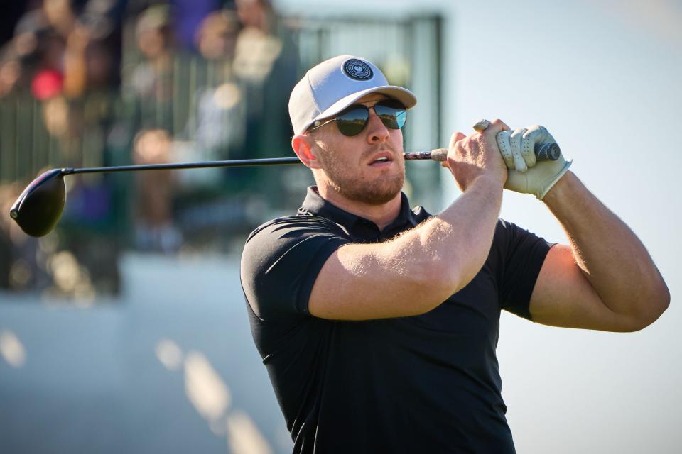 JJ Watt tees off on the first hole during the 2023 Annexus Pro-Am at TPC Scottsdale on Feb. 8, 2023.