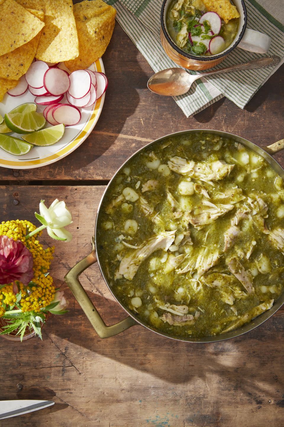 <p>If you pack this tangy pozole for lunch, bring along some tortilla chips and radish slices to add after reheating.</p><p><strong><a href="https://www.countryliving.com/food-drinks/a42435847/chicken-pozole-chimichurri-recipe/" rel="nofollow noopener" target="_blank" data-ylk="slk:Get the recipe for Chicken Pozole Verde;elm:context_link;itc:0;sec:content-canvas" class="link ">Get the recipe for Chicken Pozole Verde</a>.</strong></p>