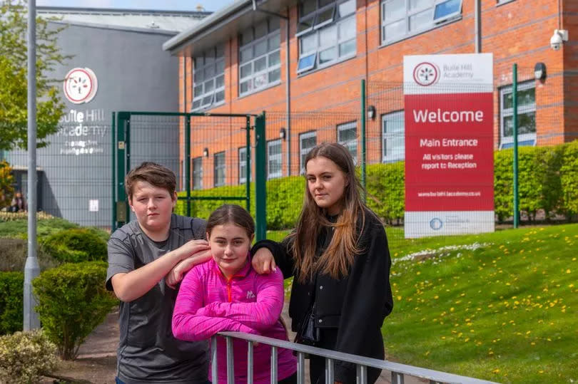 Ava, centre, with fellow pupils Alan and Maisie, who have all been suspended from Buile Hill Academy in Salford