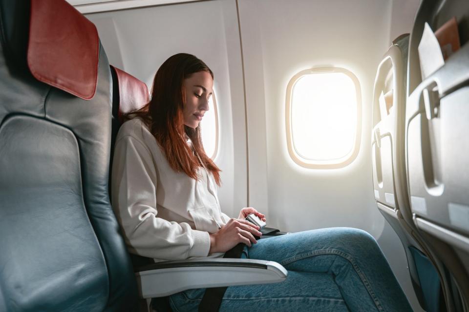 An airplane passenger. 