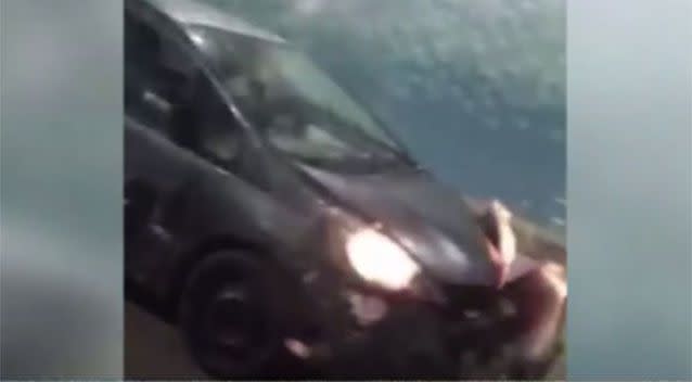 The Honda hatchback appears to deliberately ram the ute through the Hawaiian tunnel. Source: Supplied