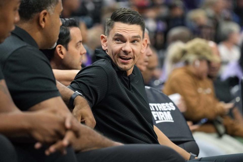 Miami Heat assistant coach Chris Quinn talks on the bench during the third quarter against the Sacramento Kings at Golden 1 Center on Oct 29, 2022 in Sacramento, California