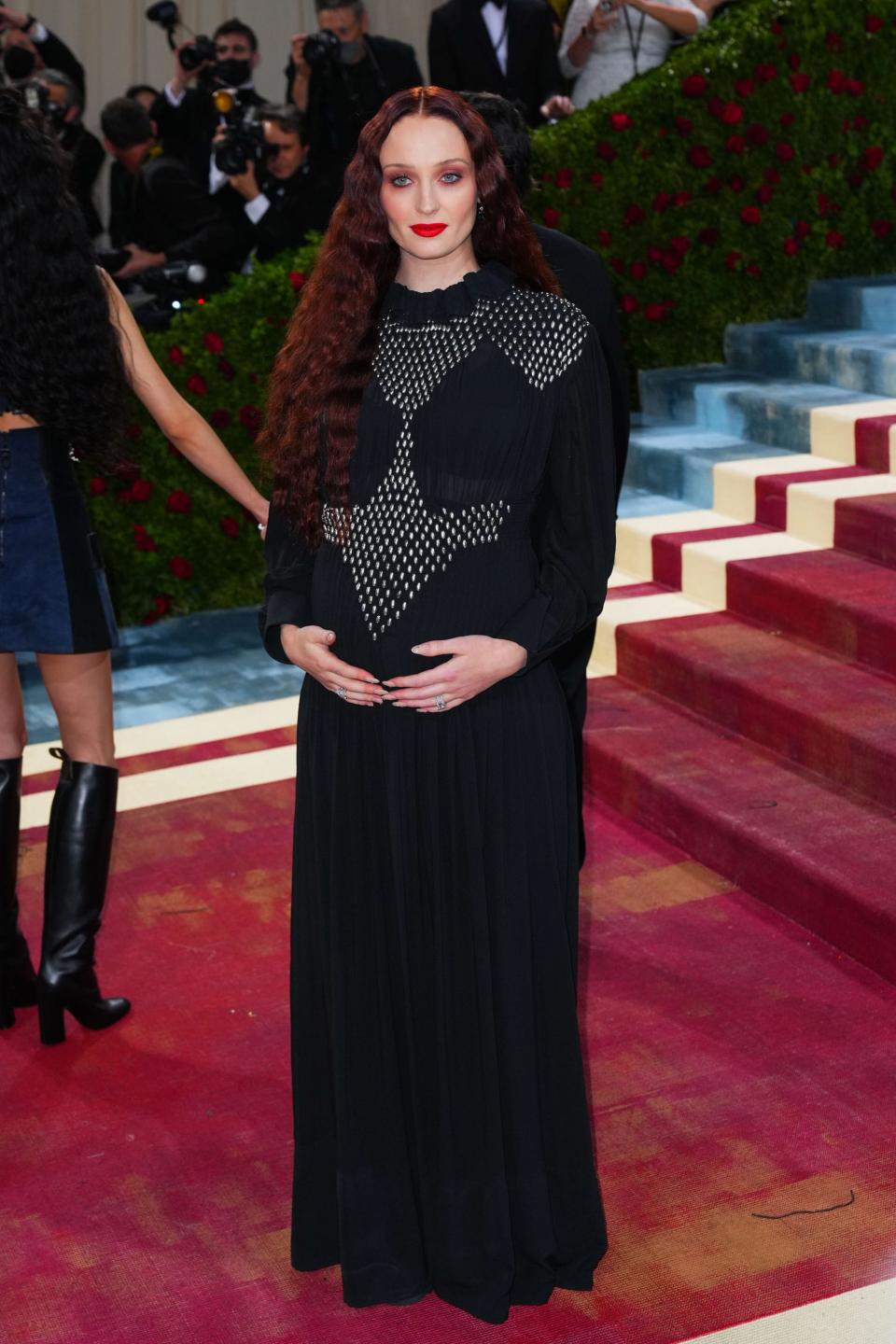 Sophie Turner walks the red carpet at the 2022 Met Gala in New York.