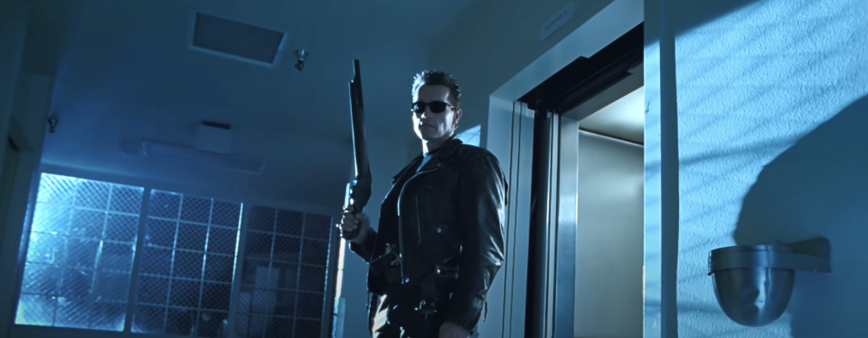 The Terminator holds a shotgun