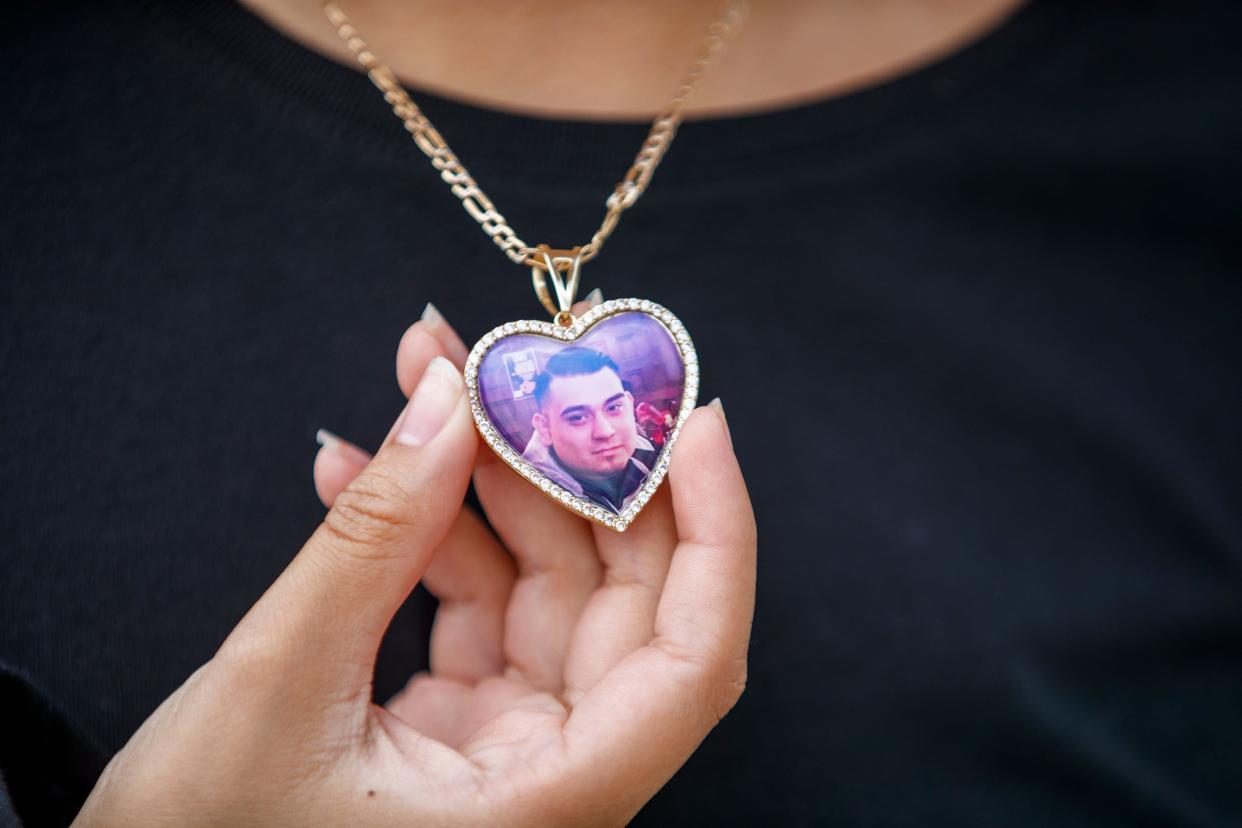 A photograph of Richard Matus Jr., who died in a Riverside County jail this month is worn by his 13-year-old daughter outside the Banning Justice Center in Banning, Calif., on August 19, 2022.