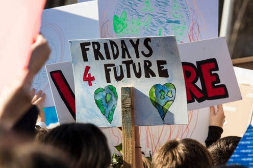   <span class="attribution"><a class="link " href="https://www.shutterstock.com/image-photo/protestors-holding-climate-change-banners-protest-1315027292?src=_Qvo5YaNYxRpaINiN5o5vQ-1-15" rel="nofollow noopener" target="_blank" data-ylk="slk:Ink Drop/Shutterstock;elm:context_link;itc:0;sec:content-canvas">Ink Drop/Shutterstock</a></span>