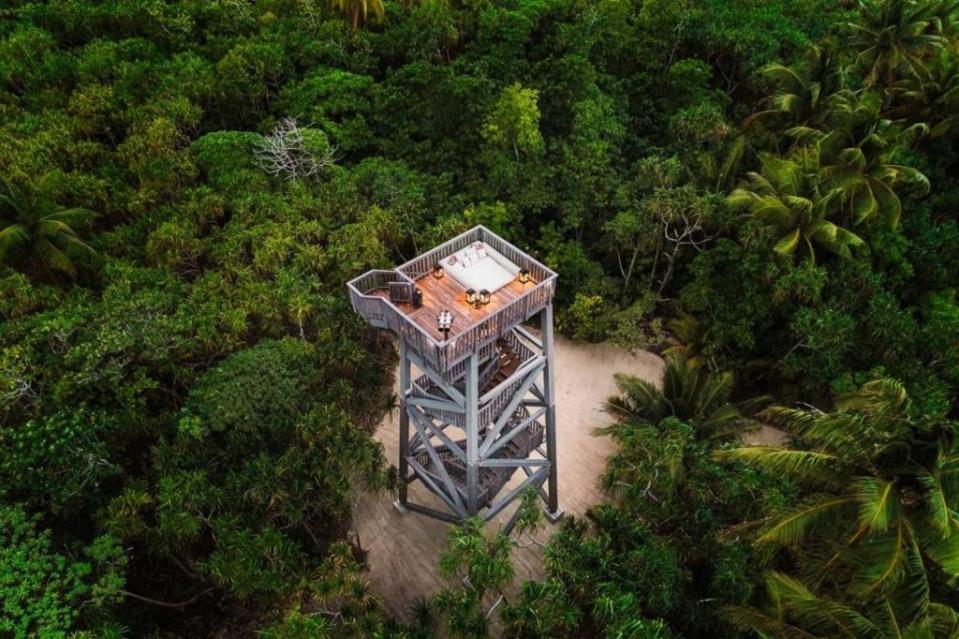 A watch tower on the island with upper level relaxation area. Maxime Messier