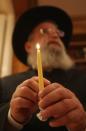 <p>On each night of the holiday, <a href="https://www.chabad.org/holidays/chanukah/article_cdo/aid/103868/jewish/How-to-Light-the-Menorah.htm" rel="nofollow noopener" target="_blank" data-ylk="slk:one additional candle (starting from the right side) is lit from the center;elm:context_link;itc:0;sec:content-canvas" class="link ">one additional candle (starting from the right side) is lit from the center</a> "Shamash" candle, according to Chabad. In total, 44 candles are lit throughout Hanukkah, but most <a href="https://www.goodhousekeeping.com/holidays/g23652651/hanukkah-candles/" rel="nofollow noopener" target="_blank" data-ylk="slk:Hanukkah candle packages;elm:context_link;itc:0;sec:content-canvas" class="link ">Hanukkah candle packages</a> for your menorah will come with eight. </p>