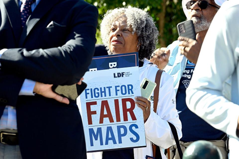 Demonstrators attend a rally outside of the US Supreme Court on 11 October. (Getty Images for Rooted Logistic)