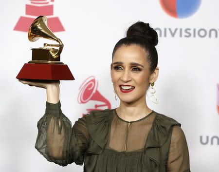 Julieta Venegas poses with her award for Best Pop/Rock Album for "Algo Sucede" during the 17th Annual Latin Grammy Awards in Las Vegas, Nevada, U.S., November 17, 2016. REUTERS/Steve Marcus