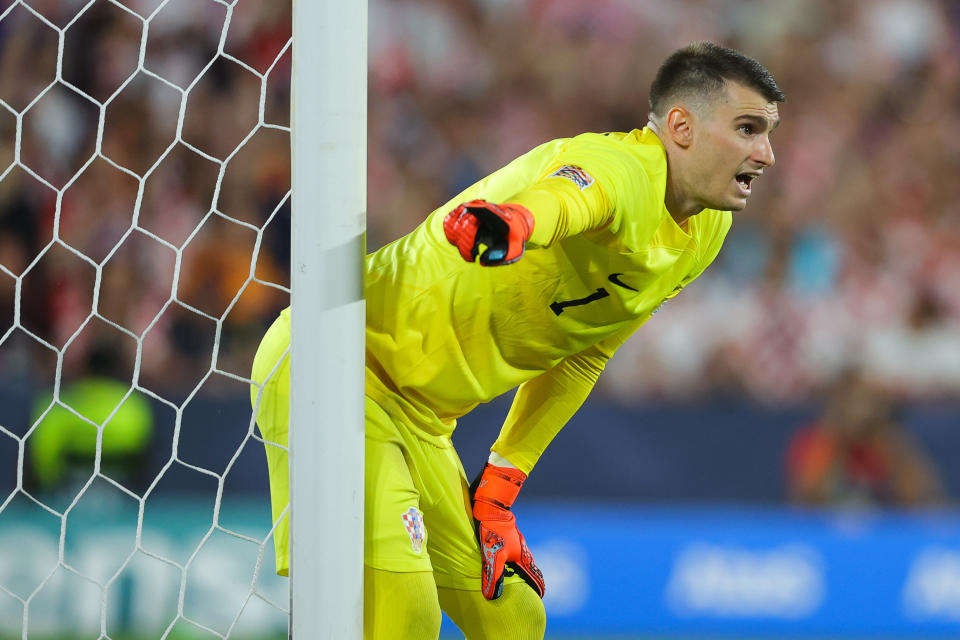 ROTTERDAM, NETHERLANDS - JUNE 14: Dominik Livakovic of Croatia during the UEFA Nations League 2022/23 semifinal match between Netherlands and Croatia at De Kuip on June 14, 2023 in Rotterdam, Netherlands. (Photo by James Gill - Danehouse/Getty Images)