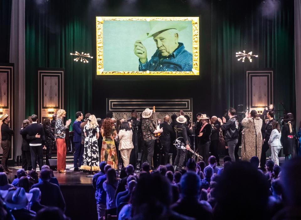 An image of Leslie Jordan is displayed above the stage at the end of a tribute concert to him at the Grand Ole Opry House Sunday, February 19, 2023.