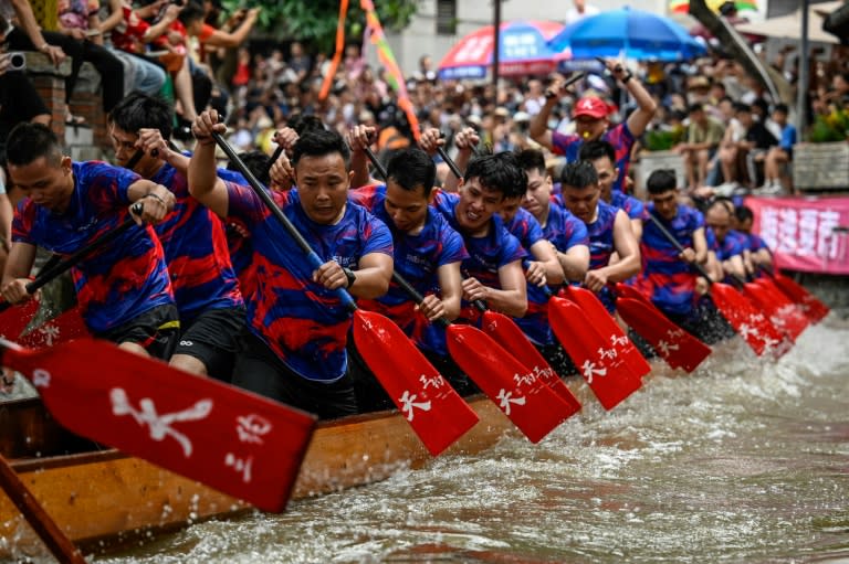 A Dragon Boat race in Foshan, in southern <a class="link " href="https://sports.yahoo.com/soccer/teams/china-women/" data-i13n="sec:content-canvas;subsec:anchor_text;elm:context_link" data-ylk="slk:China;sec:content-canvas;subsec:anchor_text;elm:context_link;itc:0">China</a>, on June 10, 2024 (JADE GAO)