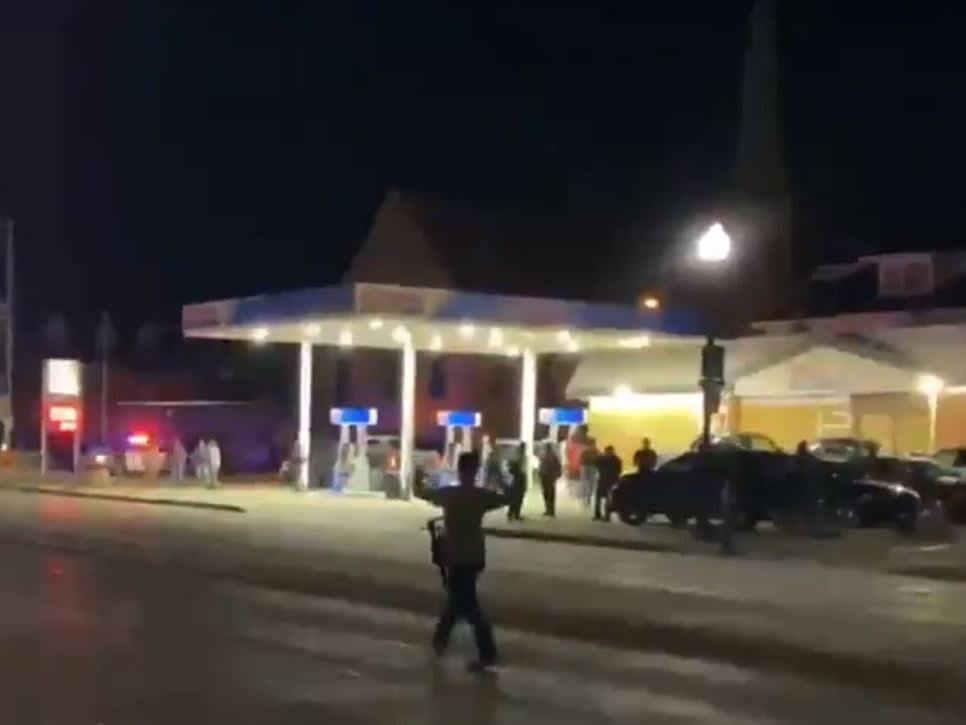 A man walks away from the scene of a shooting in Kenosha, Wisconsin: @bgonthescene