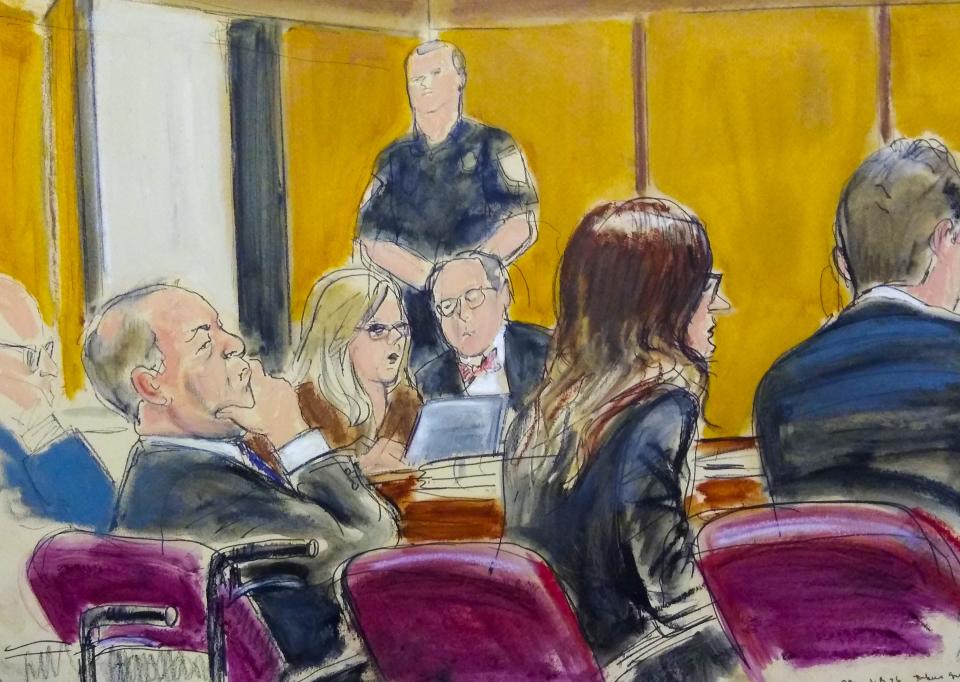 In this courtroom sketch, Harvey Weinstein, left, sits with his attorneys in Manhattan Supreme Court as the jury deliberates in his sex crimes trial Feb. 19 in New York.