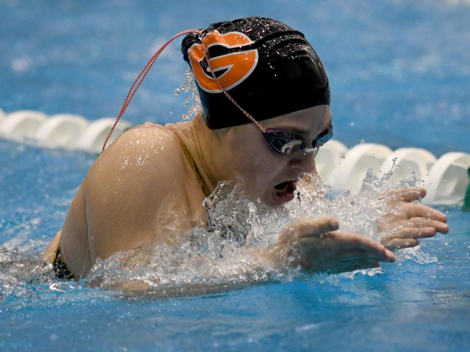 Green’s Sydney Peterson swims the girls 200-yard IM in the Division I district meet at Cleveland State, Saturday, Feb. 17, 2024.