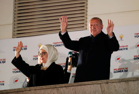 Turkish President Tayyip Erdogan and his wife Emine greet supporters in Ankara, Turkey April 1, 2019. REUTERS/Umit Bektas