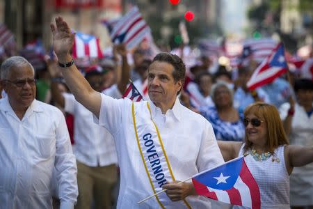 Governor of New York Andrew Cuomo participates in the National Puerto Rican Day Parade on Fifth Avenue in Manhattan, New York June 8, 2014. REUTERS/Andrew Kelly