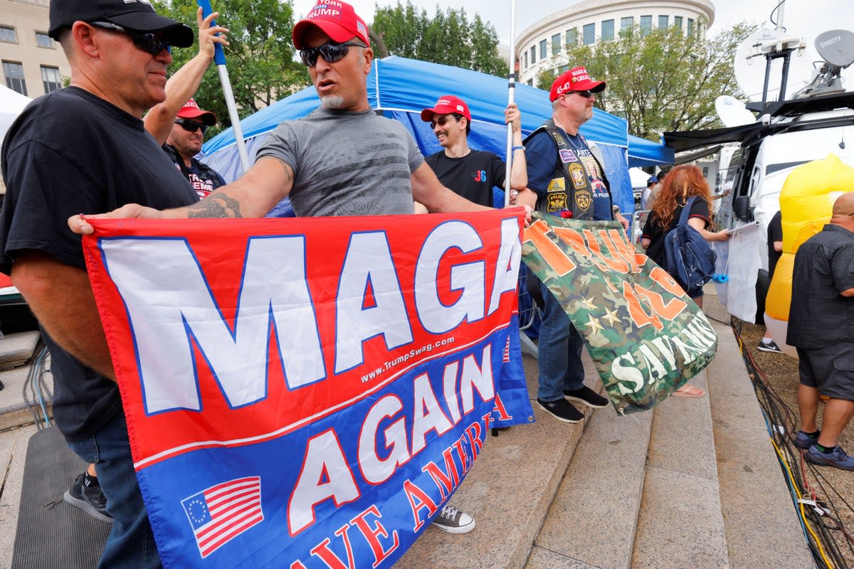 Trump supporters demonstrated outside a federal courthouse on 3 August before the former president’s arraignment on charges connected to his attempts to overturn the results of the 2020 election. (REUTERS)