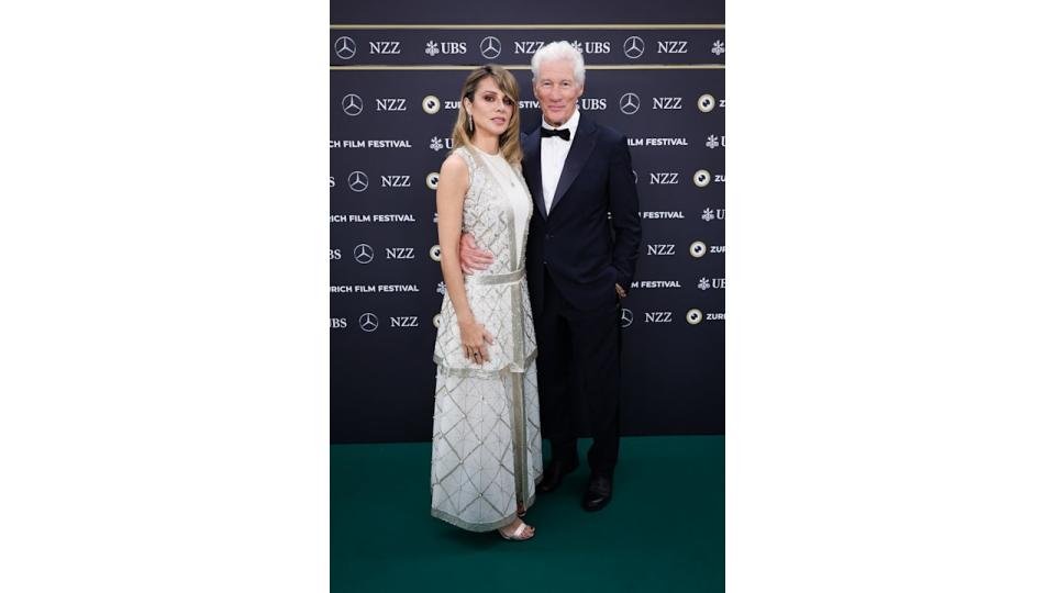 Alejandra Gere and Richard Gere attend the "Wisdom of Happiness" green carpet during the 20th Zurich Film Festival at Corso on October 08, 2024 in Zurich, Switzerland