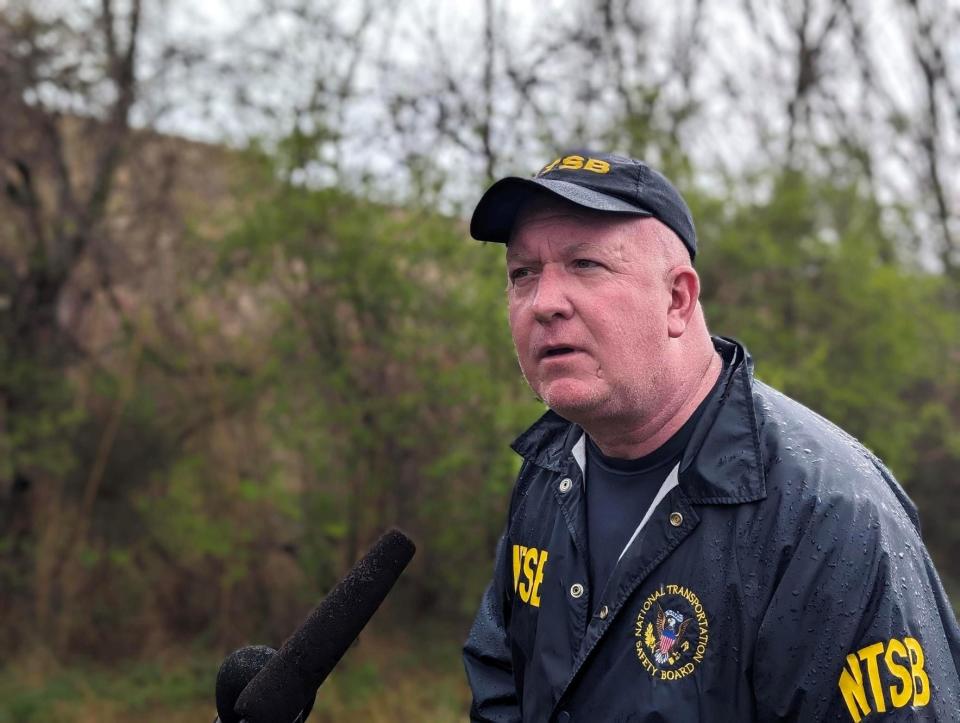 Aaron McCarter, of the NTSB, gives an update on Tuesday, March 5, 2024 from the crash scene in west Nashville, where a small plane went down overnight, narrowly missing Interstate 40 and a popular shopping mall.