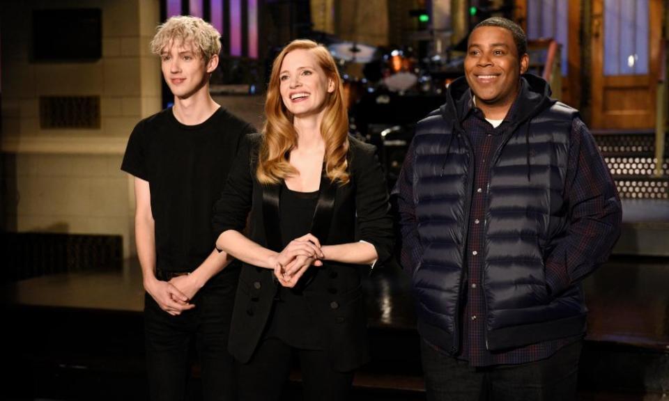 Saturday Night Live host Jessica Chastain, with musical guest Troye Sivan, left, and Kenan Thompson.