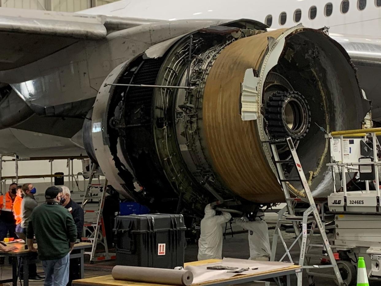 <p>The damaged starboard engine of United Airlines flight 328, a Boeing 777-200, is seen following a February 20 engine failure incident, in a hangar at Denver International Airport in Denver, Colorado, on 22 February 2021</p> ((Reuters))