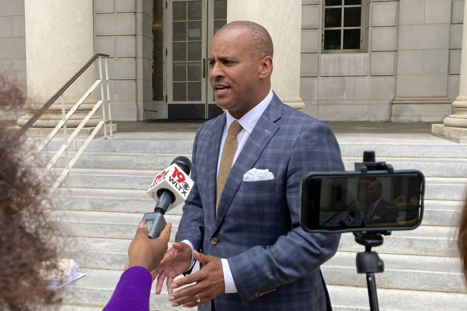 Attorney Todd Rutherford speaks to reporters about the 16 years knocked off his client Jeroid Price's sentence outside the South Carolina Supreme Court after a hearing Wednesday, April 26, 2023, in Columbia, S.C. The justices canceled the sentence reduction a few hours later. (AP Photo/Jeffrey Collins)