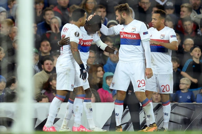 Lyon's Burkinabe striker Bertrand Traore (2nd L) celebrates with teammates after scoring their second goal during the UEFA Europa League Group E match against Everton October 19, 2017