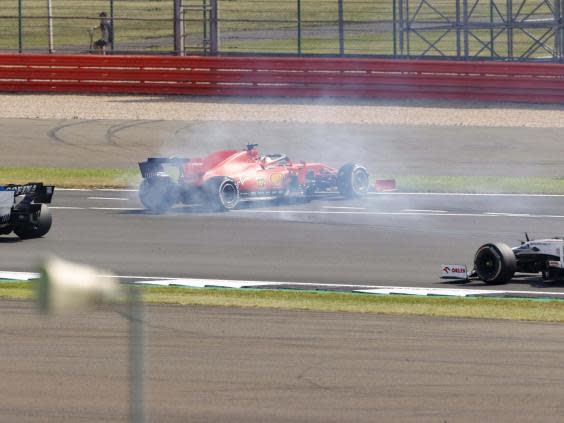 Sebastian Vettel spun off at the first corner as his miserable season continued (EPA)