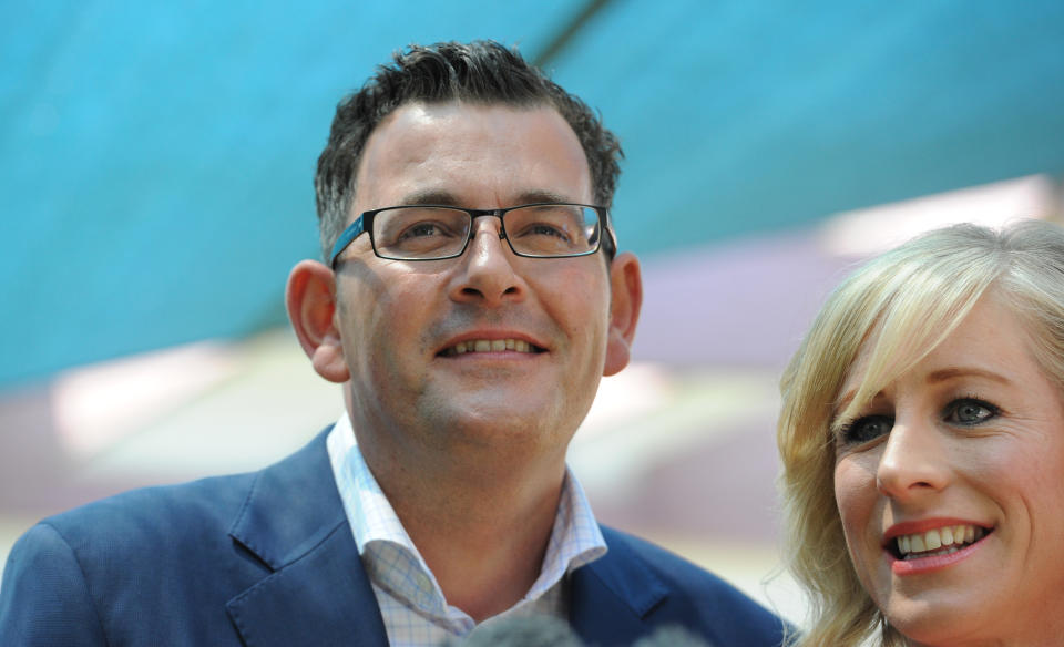 Victorian opposition leader Daniel Andrews (left) and Cath Andrews campaign at Godfrey Street Community House in Bentleigh in Melbourne, Friday, Nov. 28, 2014. Victoria goes to the polls in a state election tomorrow. (AAP Image/Julian Smith) NO ARCHIVING