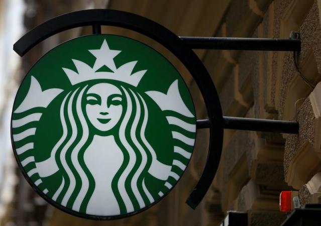 FILE PHOTO: A Starbucks logo is seen at a Starbucks coffee shop in Vienna